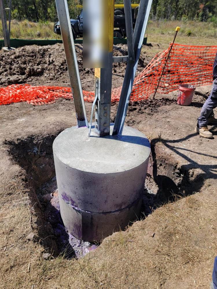 Completed encased tower footing