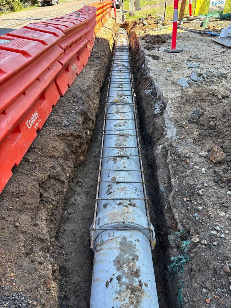 Encased stormwater pipe in trench